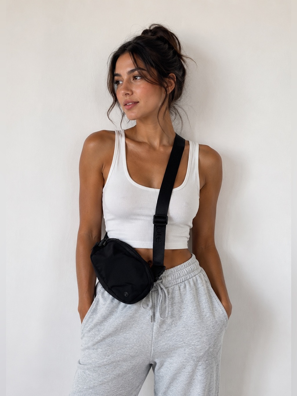 Lole Black Crossbody Bag with Adjustable Strap and Compact Design